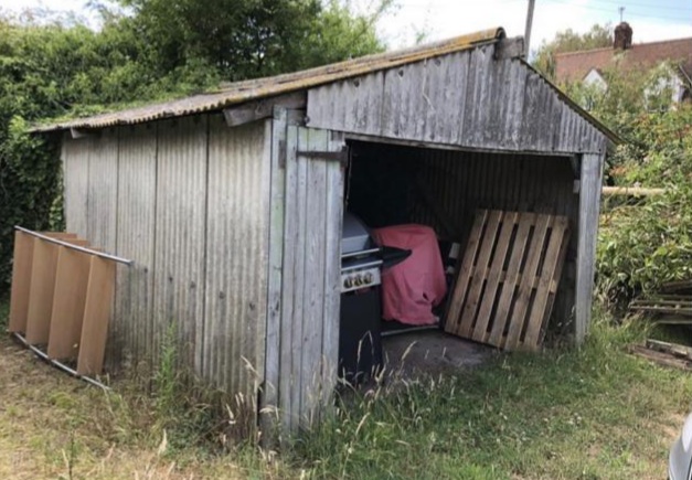 Timber shed pictured before demolition